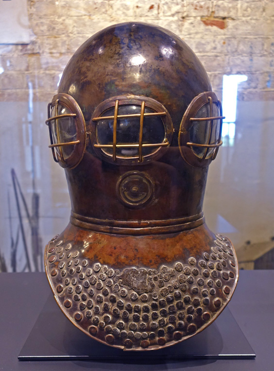 photo of the Deane helmet on display in the Diving Museum at Gosport.