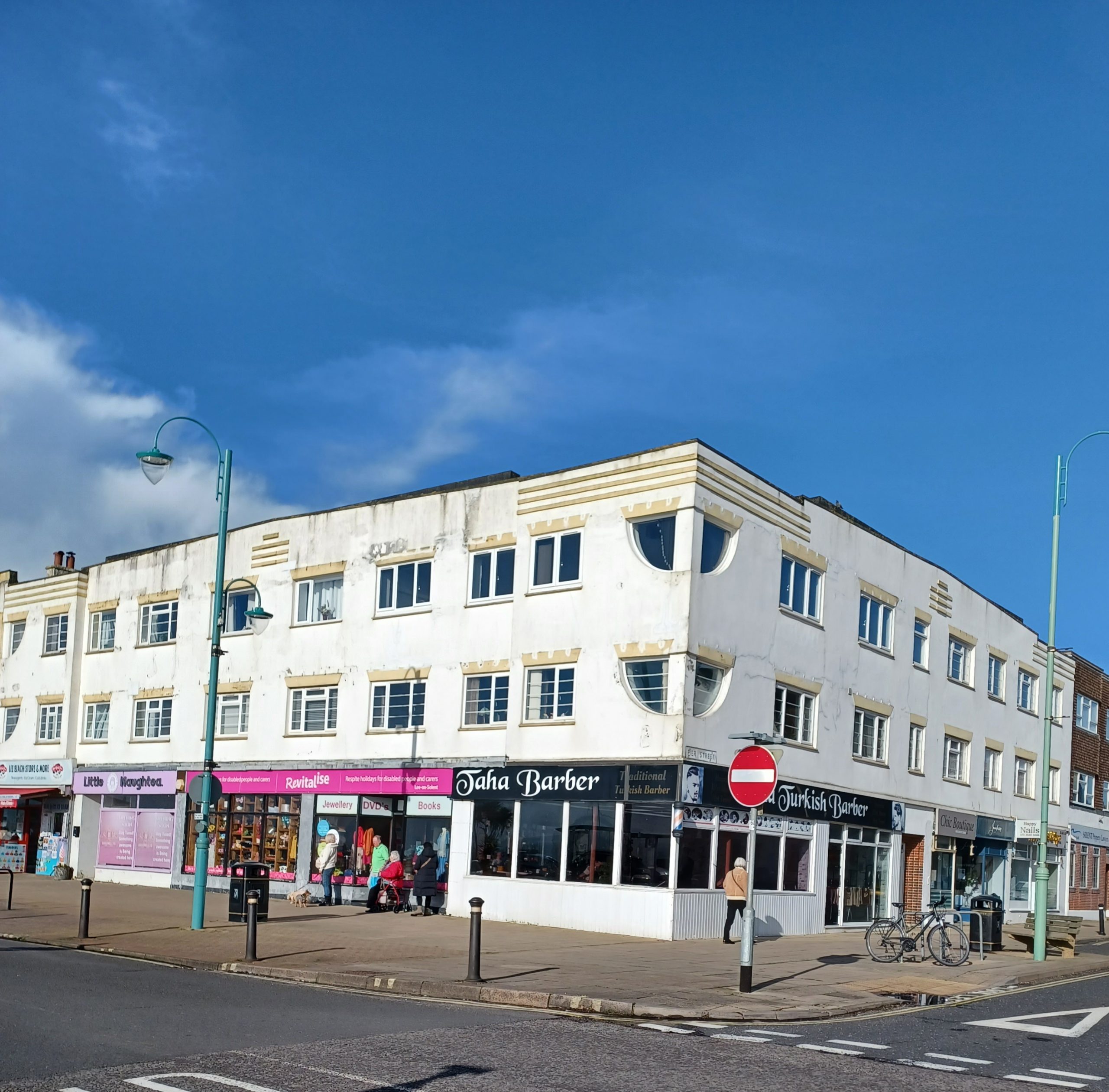 Two floors of Art Deco apartments above a number of shop fronts